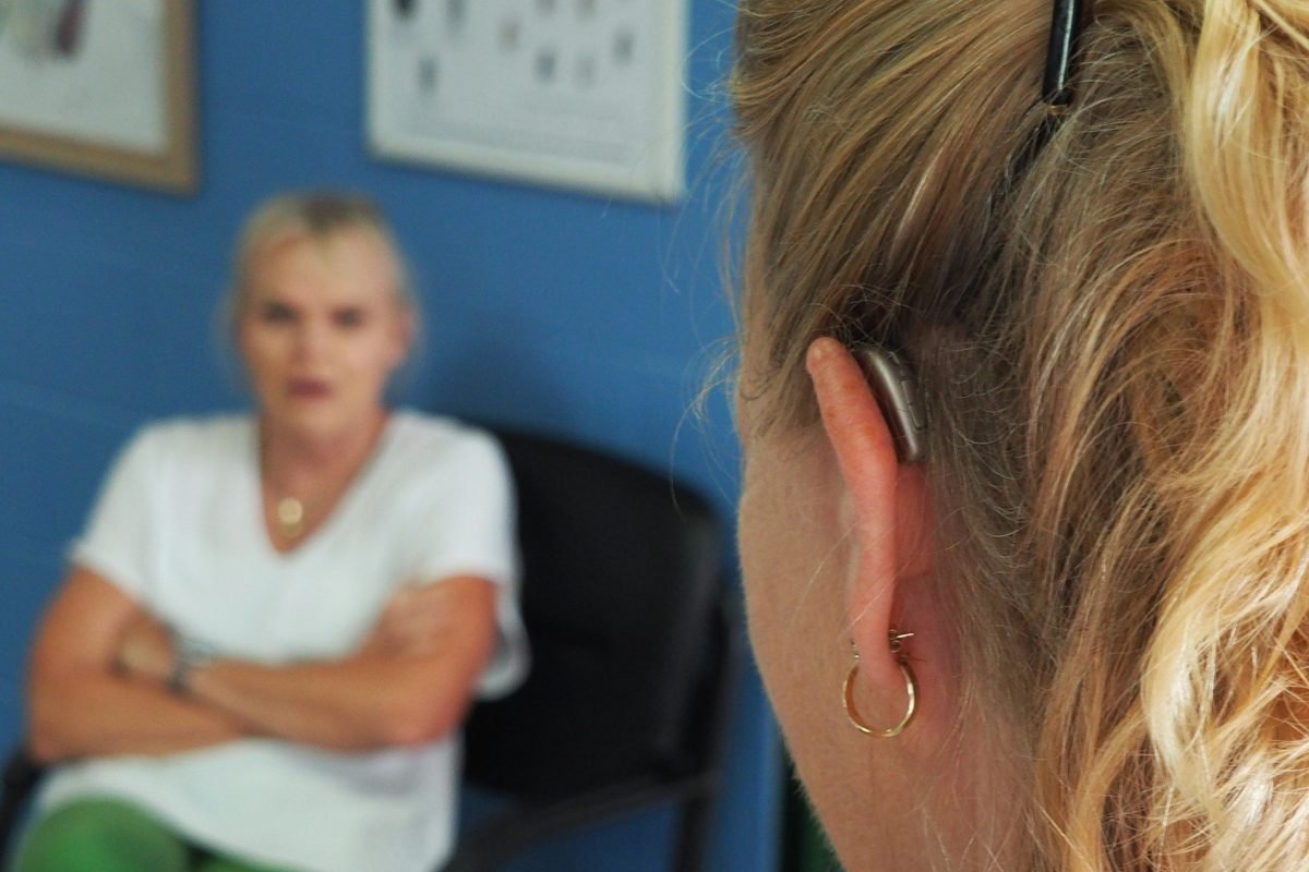 Patient seated in a calm clinic consultation room