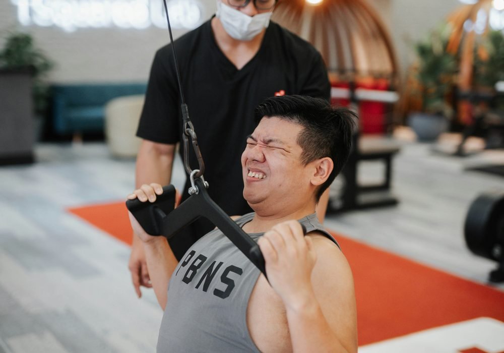 Athlete performing a cable strength exercise